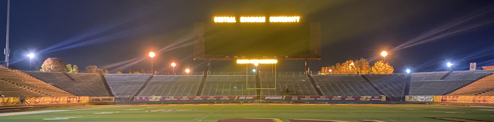 empty football stadium at night under the lights Detroit