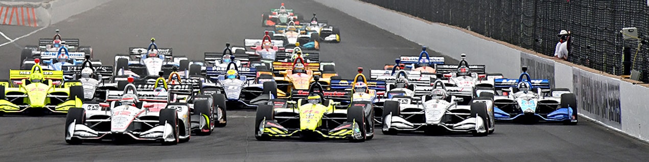 indy cars racing to through the start line Detroit
